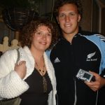 Ciara Mackey with one of the New Zealand All Blacks on their trip to Donegal